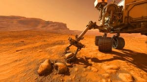 Illustration de la découverte de "mudstones" potentiellement porteurs de biosignatures dans le cratère Jezero sur Mars.