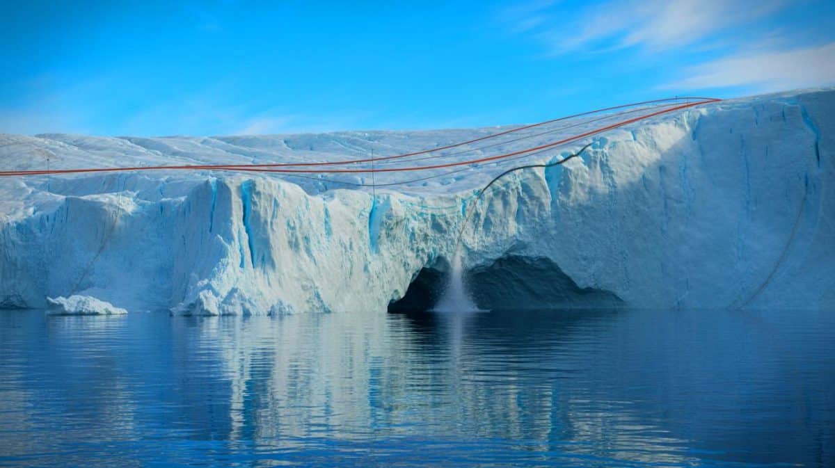 Ces blocs de glace géants comme des stades s’effondrent dans l’océan et créent des tsunamis dévastateurs détectés par fibre optique Illustration de la surveillance des glaciers du Groenland grâce à des câbles en fibre optique innovants.
